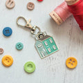 Prim Village Enamel Charm